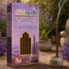 Harimodini Lavender bambooless dhoop sticks box with transparent golden window, visible dhoop sticks, free ceramic holder, and burning dhoop stick.