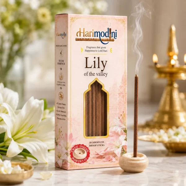 Harimodini Lily of the Valley bambooless dhoop sticks box with transparent golden window, visible dhoop sticks, free ceramic holder, and burning dhoop stick.