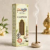 Harimodini Camphor dhoop sticks box with burning bambooless dhoop stick in free ceramic holder and soft smoke.