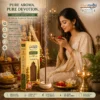 Indian woman praying in puja room with Harimodini Javadhu dhoop sticks, burning Javadhu dhoop and idol.